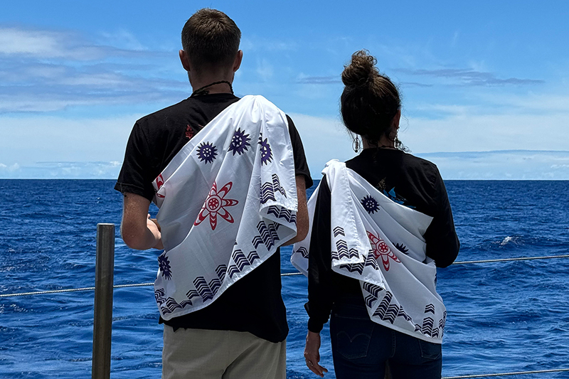 During the Beyond the Blue: Papahānaumokuākea Mapping 1 expedition, Native Hawaiian cultural liaisons, Malia Kapuaonālani Evans and Makoa Pascoe, were an important part of the expedition team, sharing and leading protocols and cultural practices while work was being completed in Papahānaumokuākea Marine National Monument.