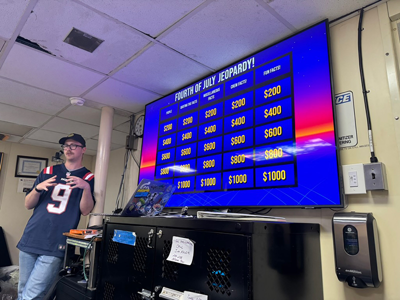 Image of Fourth of July Jeopardy created and hosted by Aidan in the forward lounge during the Beyond the Blue: Papahānaumokuākea Mapping 1 expedition.