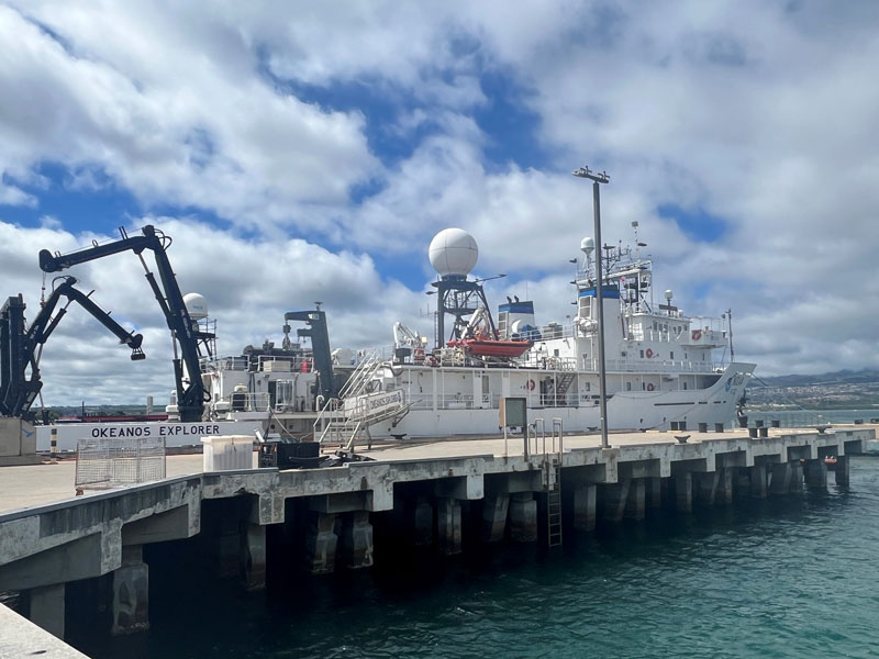 Explorer-in-training Edward Kim works to process multibeam bathymetry data collected during an expedition on NOAA Ship Okeanos Explorer. Three explorers-in-training will join the Beyond the Blue: Papahānaumokuākea Mapping 1 expedition in this role.