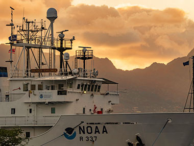 Image of NOAA Ship Okeanos Explorer docked at Ford Island in Honolulu, Hawai‘i, at the start of the first of the two expeditions.