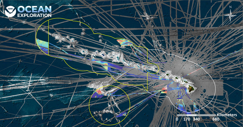 Map of high-resolution bathymetric data collected by NOAA Ocean Exploration on NOAA Ship Okeanos Explorer in the 2024 field season. Previously existing data are displayed in grayscale with new coverage displayed in color. Yellow boundaries represent the Papahānaumokuākea Marine National Monument and the Johnston Atoll Unit of the Pacific Islands Heritage Marine National Monument.