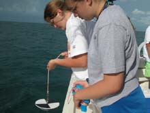 girl scouts with secchi disc