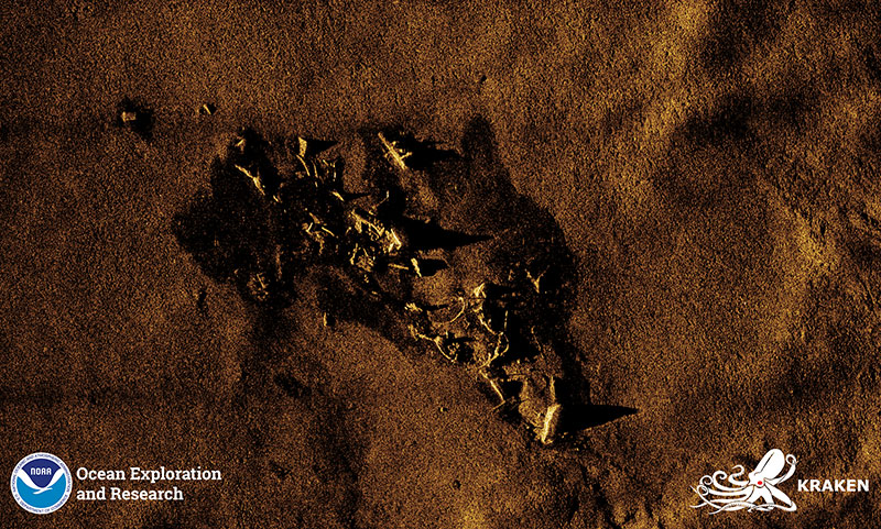 SAS image of the USS G-1 collected by the KATFISH system. Salvage work in the 1960s appears to have caused considerable damage to the G-1, leaving a heavily disturbed shipwreck marked by large debris.  Image courtesy of Kraken Robotics.