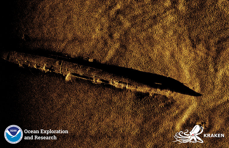 Synthetic Aperture Sonar imagery of the USS L-8, developed using data collected using the KATFISH. The submarine is largely intact and appears to be resting on its port side. Sections of the outer hull are missing, likely caused when the vessels propellers were removed in the late 1980s. Image courtesy of Kraken Robotics.